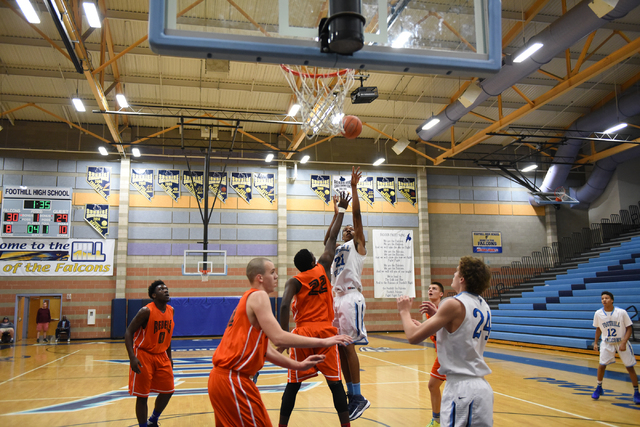 Foothill’s Torrance Littles (21) goes up for a shot against National Prep Academy&#821 ...