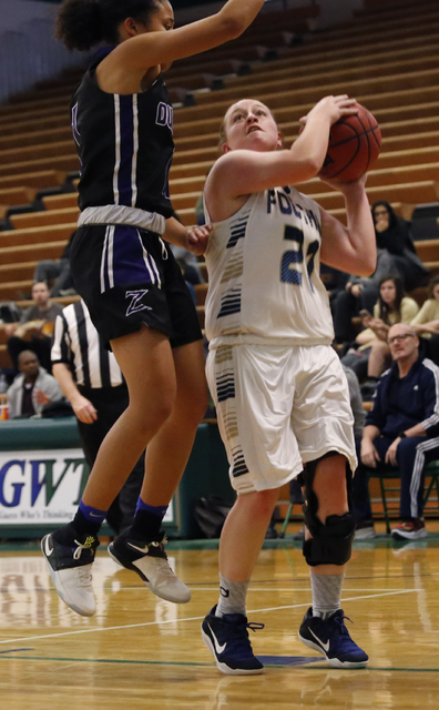 Foothill’s Rhianna Cox attempts a shot during a high school basketball game at the Gat ...