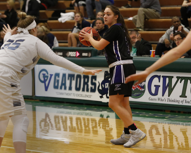 Durango’s Lindiana Boku (34) looks for a pass during a high school basketball game at ...