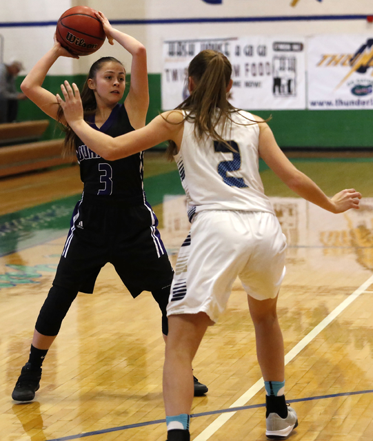 Durango’s Erica Stiles looks for a pass during a high school basketball game at the Ga ...