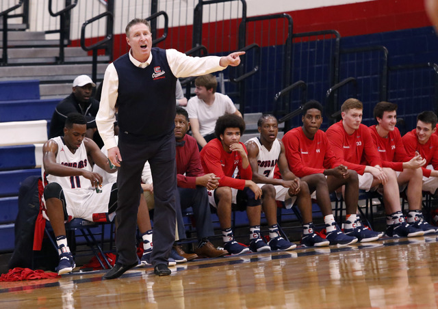 Coronado’s head coach Jeff Kaufman coaches during the first half of a high school bask ...