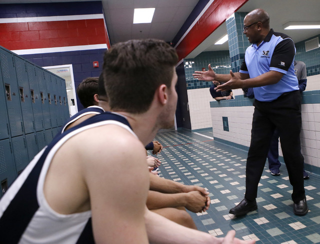 Foothill’s head coach Kevin Soares coaches during halftime at a high school basketball ...