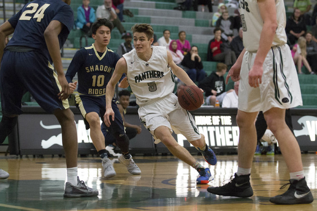 Palo Verde senior James Camp drives the ball to the net during the team’s game against ...