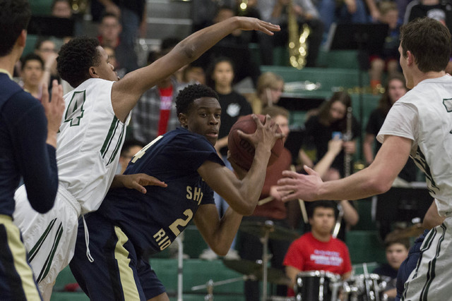 Shadow Ridge senior Obi Okafor looks for someone to pass to during their game at Palo Verde ...