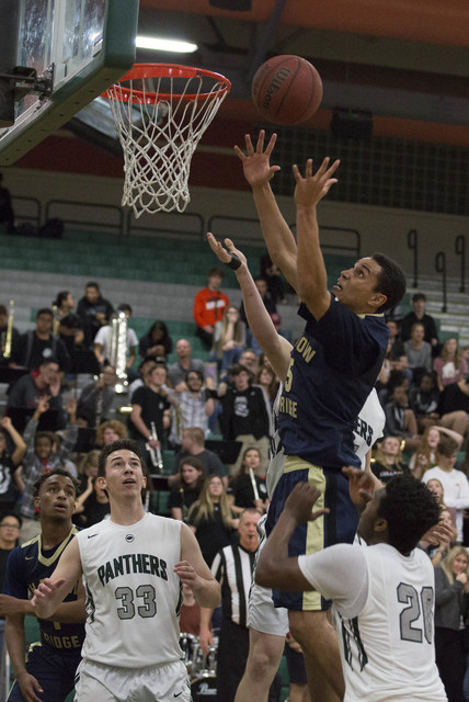 Shadow Ridge senior Bricin Ford attempts a shot at Palo Verde High School on Thursday, Feb. ...