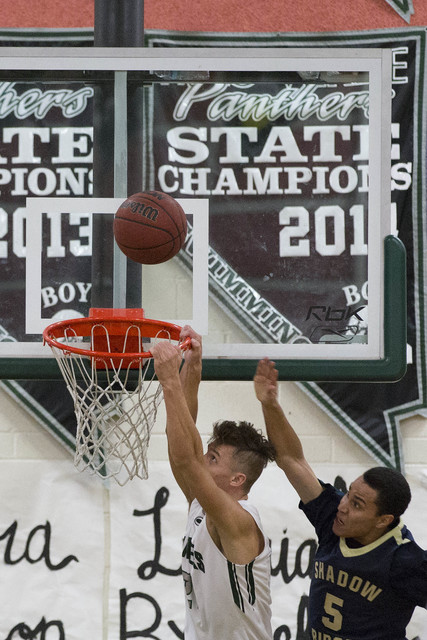 Palo Verde senior James Camp makes a slam dunk on Shadow Ridge at Palo Verde High School on ...