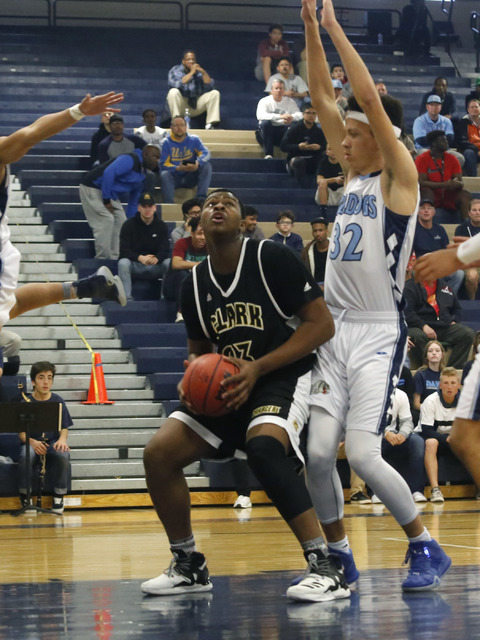 Clark’s Antwon Jackson (23) looks for a shot during the first half of a semifinals Sun ...