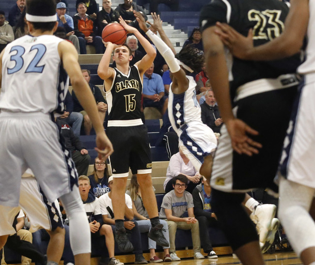 Clark’s James Bridges (15) shoots during the first half of a semifinals Sunset Region ...