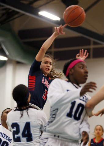 Liberty’s CeCe Quintino, back, goes up for a shot during Wednesday’s game at Can ...