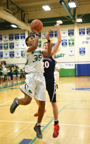 Green Valley’s Isiah Macklin (35) shoots the ball against Coronado’s Nick Kornie ...