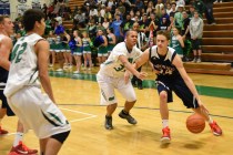 Coronado’s Jake DesJardins (24) drives past Green Valley’s Myles Dunn (33) on We ...