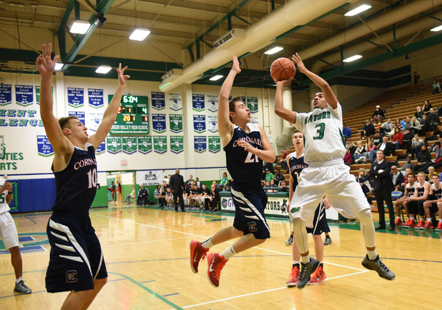 Green Valley’s Kelvin Omojola (3) shoots the ball over Coronado’s Andrew Palma ( ...