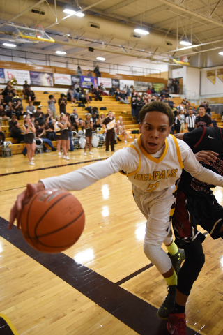 Bonanza guard Travis Jenkins (2) attempts to save the ball against the Desert Oasis defense ...