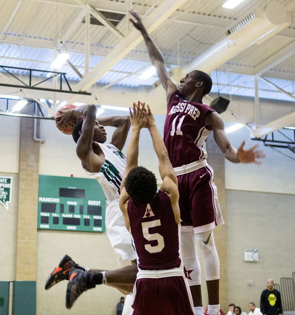 Rancho Rams Senior Justin Holiday (15), shoots the ball against Agassi Prep at Rancho High S ...