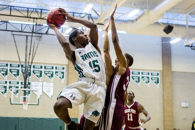 Rancho Rams Senior Justin Holiday (15), shoots the ball against Agassi Prep at Rancho High S ...