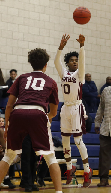 Agassi’s Akeemis Williams (0) shoots during a boys basketball game on Wednesday, Jan. ...