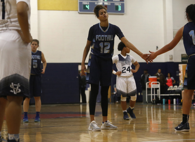 Foothill Rae Burrell (12) reacts after a free throw shot during a basketball game at Spring ...