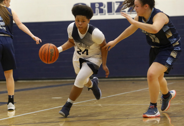 Spring Valley’s Deja McDonald drives towards the hoop during a basketball game at Spri ...