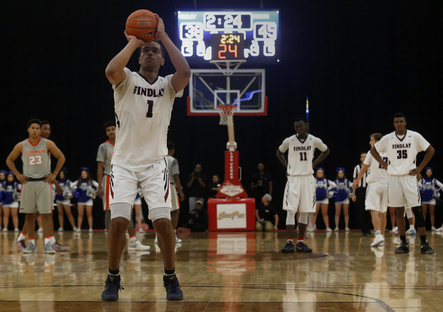 Findlay Prep’s P.J. Washington (1) shoots a free throw after a technical foul was call ...