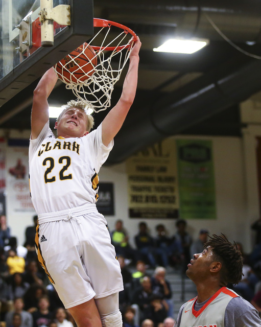 Clark’s Trey Woodbury (22) dunks against Bishop Gorman during a basketball game at Cla ...