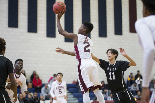 Agassi Prep’s Elijah Parker (2) goes up for a layup against Mountain View in the boy&# ...