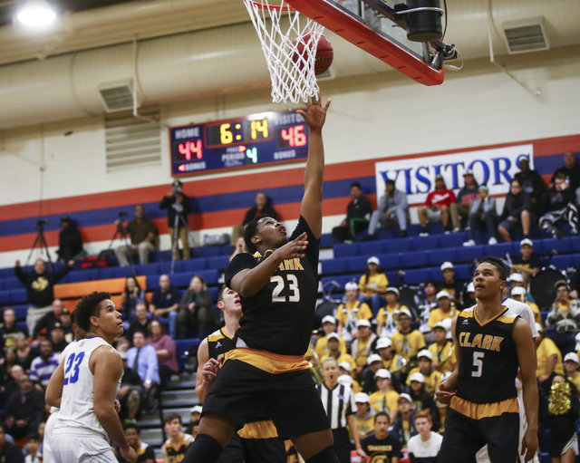 Clark forward Antwon Jackson (23) goes up to shoot during a basketball game at Bishop Gorman ...