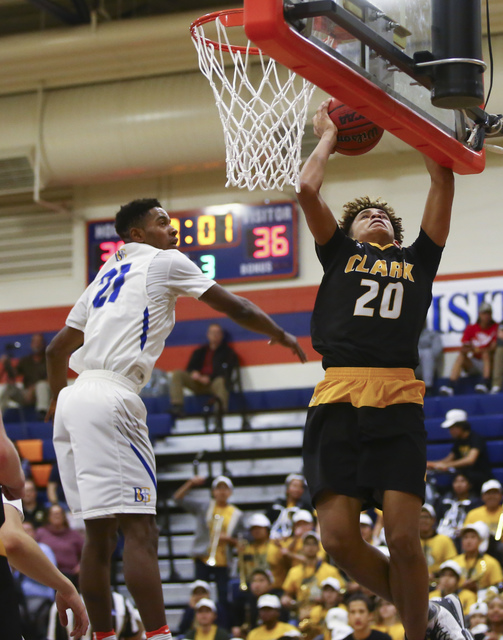 Clark forward Jalen Hill (20) goes up to the basket against Bishop Gorman guard Christian Po ...