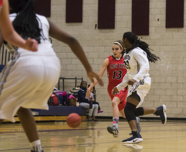 Lincoln County guard Kailey Kelley (13) drives the ball during a game against Lincoln County ...