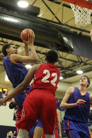 Bishop Gorman’s Chase Jeter (4) goes up for a shot during their scrimmage game against ...
