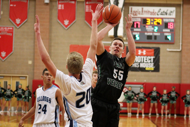 Palo Verde’s Kyler Hack shoots over Centennial’s Garett Scheer on Thursday. Palo ...