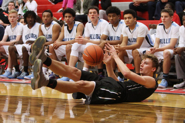 Palo Verde forward Grant Dressler hits the floor while chasing a loose ball on Thursday. Dre ...