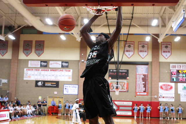 Palo Verde forward Jamell Garcia-Williams dunks against Centennial on Thursday. The Panthers ...