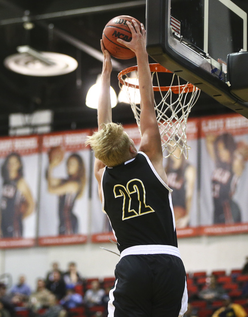 Clark guard Trey Woodbury (22) dunks against Coronado during the Class 4A boys state basketb ...