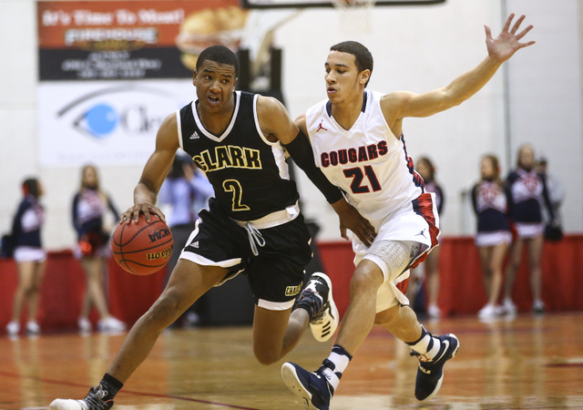 Clark guard Sedrick Hammond (2) drives to the basket against Coronado’s Freddy Reeves ...