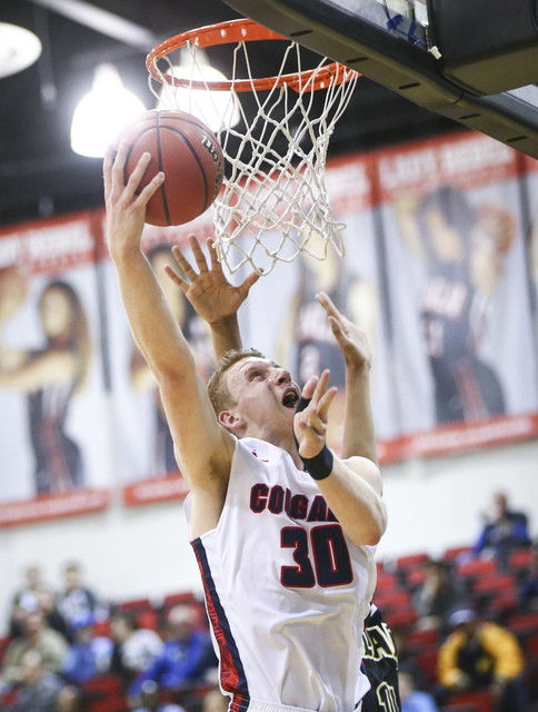 Coronado’s Kennedy Koehler (30) shoots against Clark during the Class 4A boys state ba ...