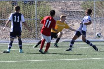 Valley’s Marco Gonzales (11) shoots the ball past Foothill goalie Derek Lawson (00) du ...