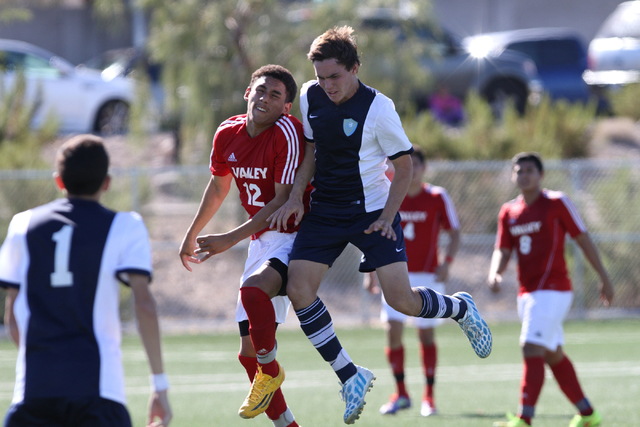 Valley’s Damian Alvarez (12) and Foothill’s Mason Reid (2) battle for the ball d ...