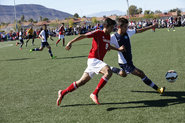 Foothill’s Rony Estrada (6) and Valley’s Alejandro Parra (9) compete for possess ...