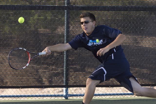 Green Valley’s Brandon Farber plays a tennis game against Green Valley’s Ben Lie ...