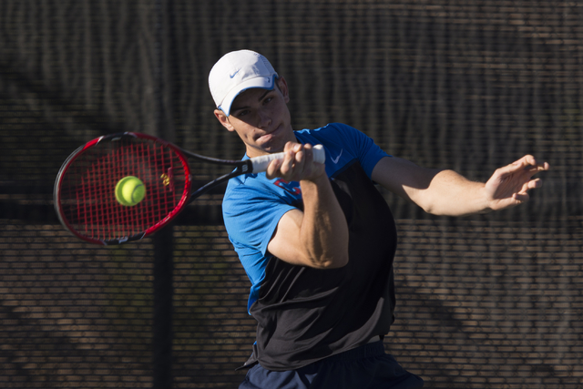 Coronado’s Martin Rizov plays a tennis game against Silverado’s Seth Forstner du ...