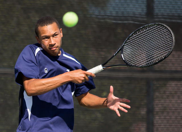 Liberty’s Al Gourrier follows through during a doubles set in the Sunrise Region boys ...