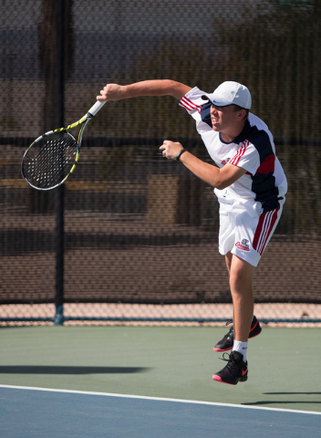 Coronado’s Sam Grant serves during the Sunrise Region boys team championship at Darlin ...