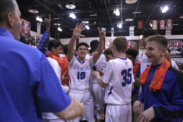 Bishop Gorman’s players react after winning a Class 4A boys state final championship g ...