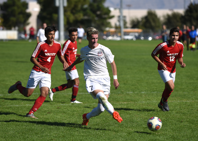 Coronado’s John Lynam (7) kicks the ball against Valley during the Sunrise region boys ...