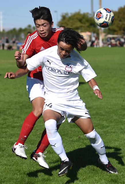 Coronado’s Lincoln Aquino (24) battles for the ball against Valley’s Erick Galle ...