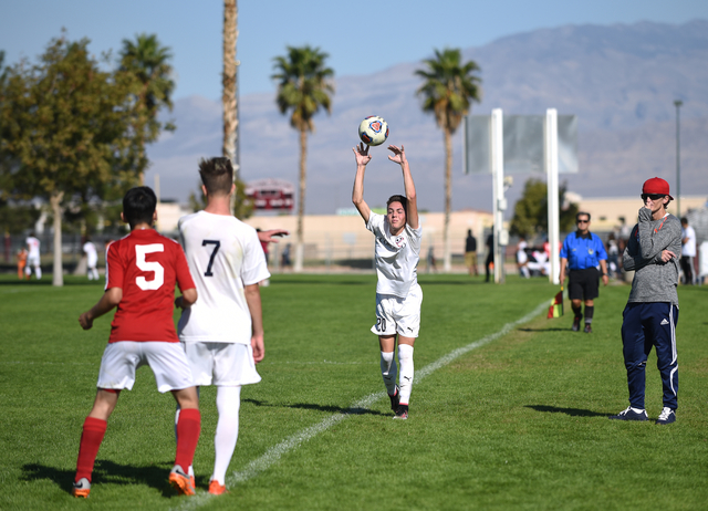 Coronado’s Jake Balauf (20) throws the ball in play against Valley during the Sunrise ...