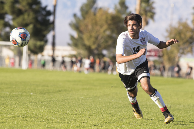 Alejandro Graciano (14) from Las Vegas High School goes for the ball during the Sunrise Regi ...