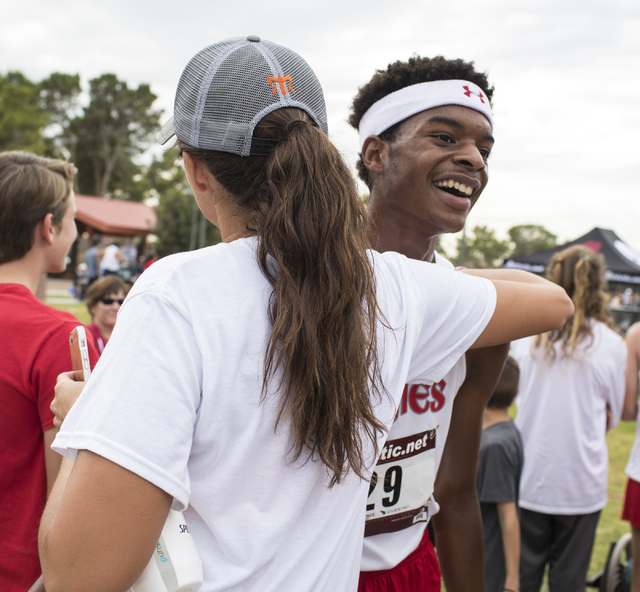 Keith Williams, right, is congratulated by Arbor View’s head coach Sheina Torres after ...