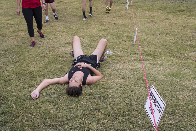 Jason Johnson rests after completing the Sunrise Boys 2016 NIAA Southern Regional cross coun ...