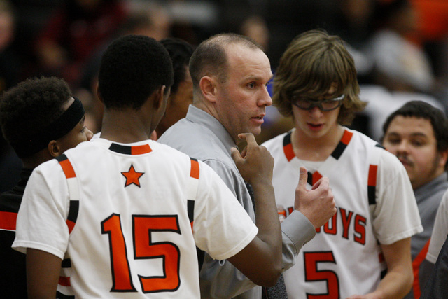 Chaparral head coach Steven Bentz talks to his team during a timeout in their game against D ...